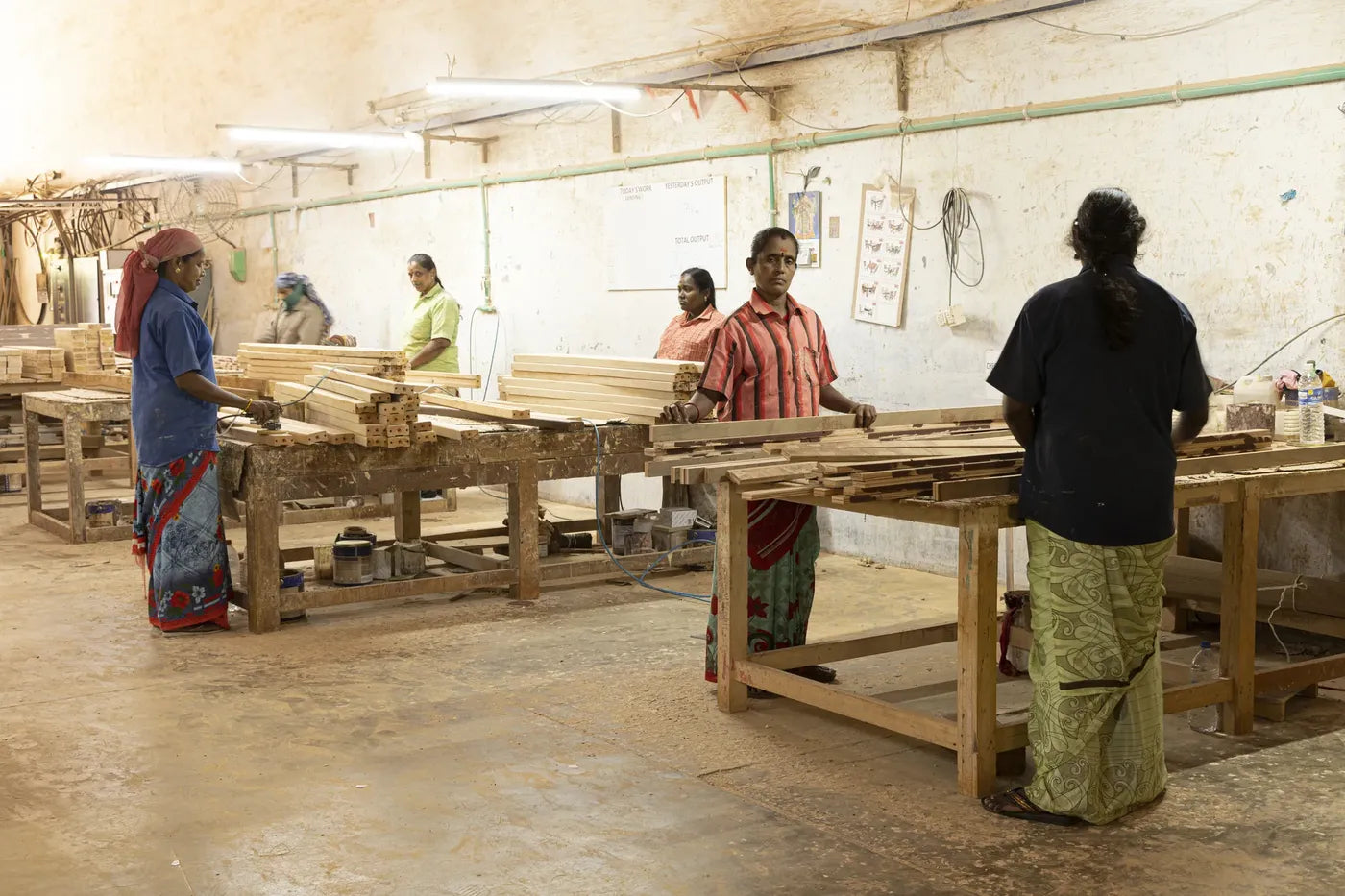 The team working at assembly benches