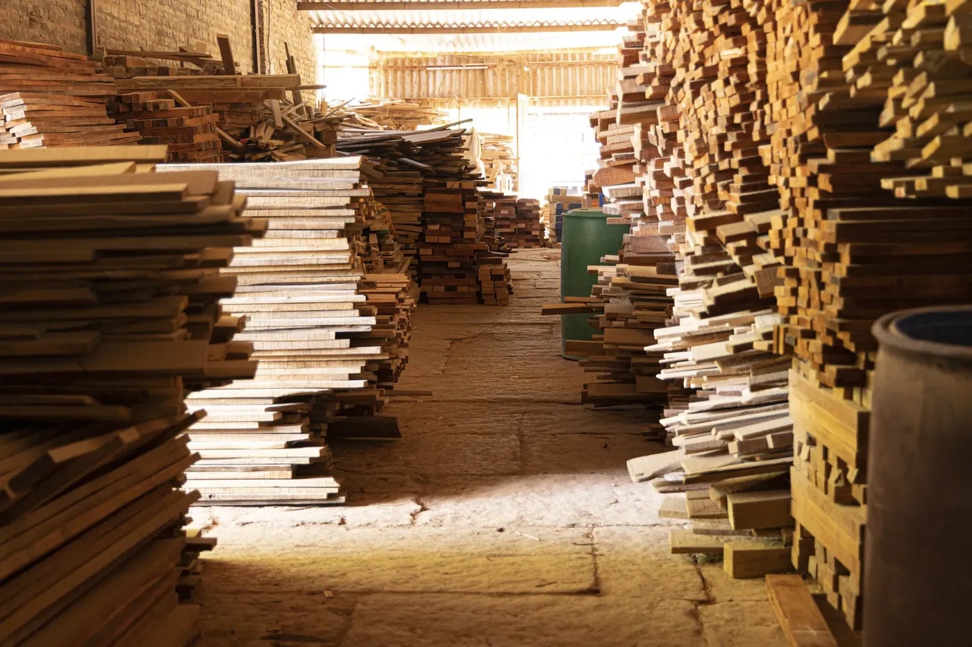 Stacks of timber planks in the workshop yard
